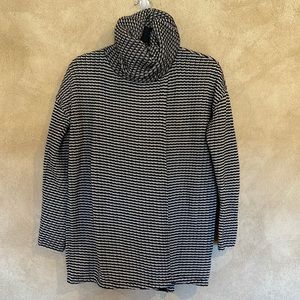 CAbi black and cream turtleneck sweater.  Open overlay in front and back.